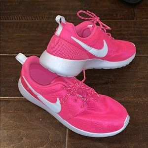 Hot pink nike shoes